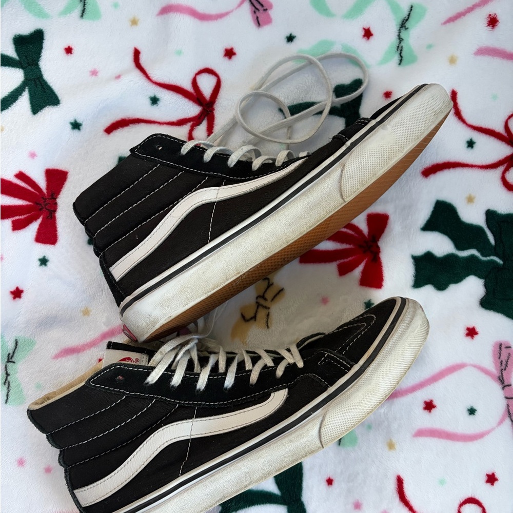 Vans Black and White High-Top Sneakers
